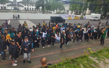 Pererat Sinergi, DPC Peradi Bandung dan PN Bandung Gelar Jalan Sehat Kampanye Anti-Suap
